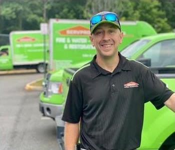 SERVPRO employee with beanie and sunglasses on head